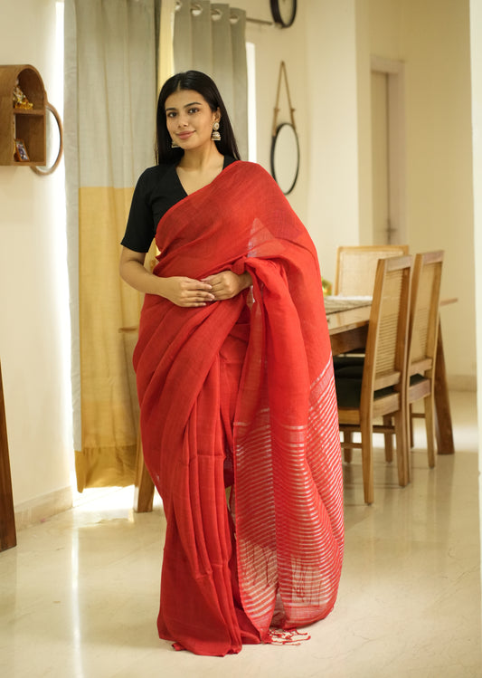 Rustic Bloom – Red Linen Saree with Zari Striped Pallu