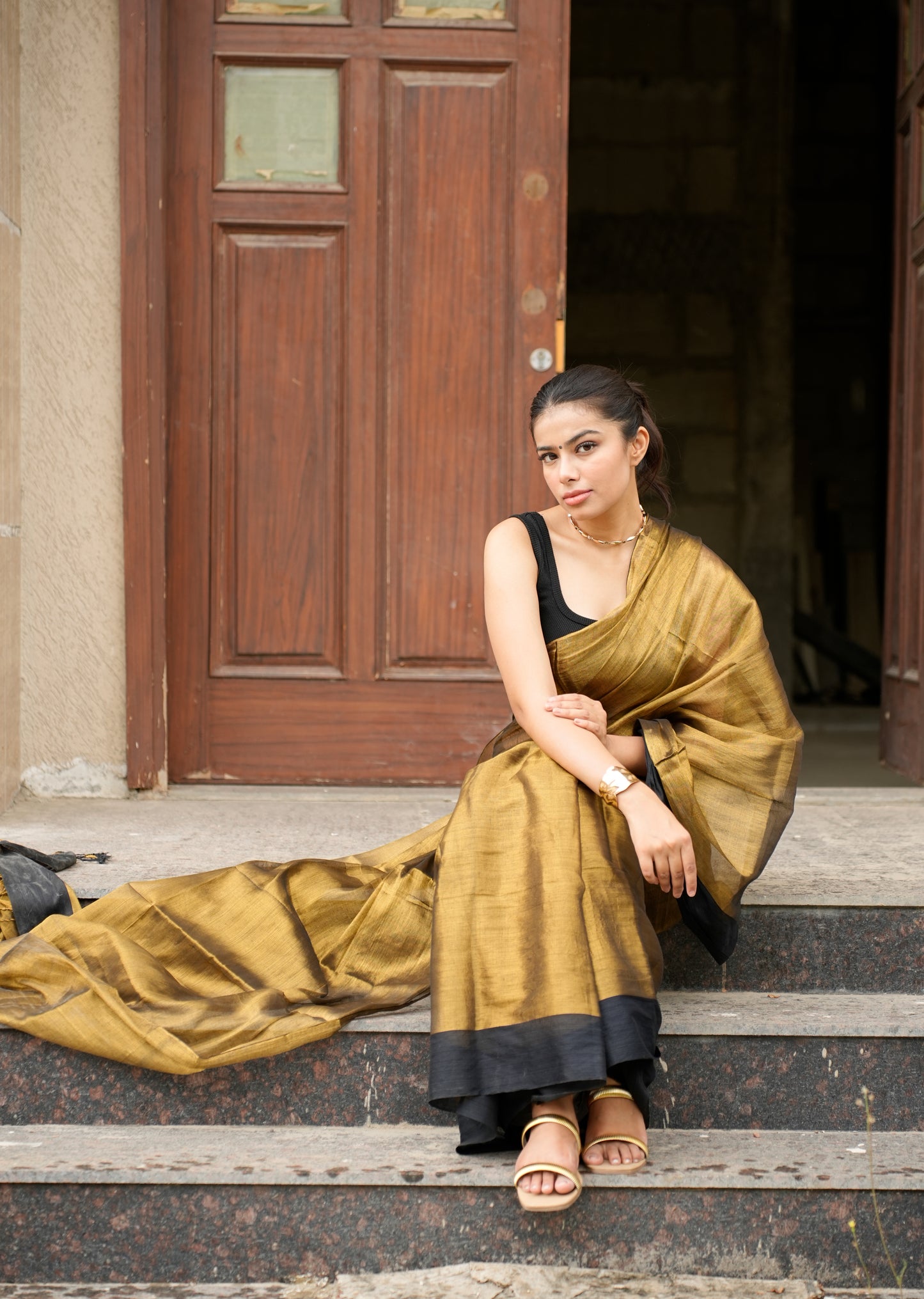 Molten Majesty – Antique Gold Tissue Silk Saree