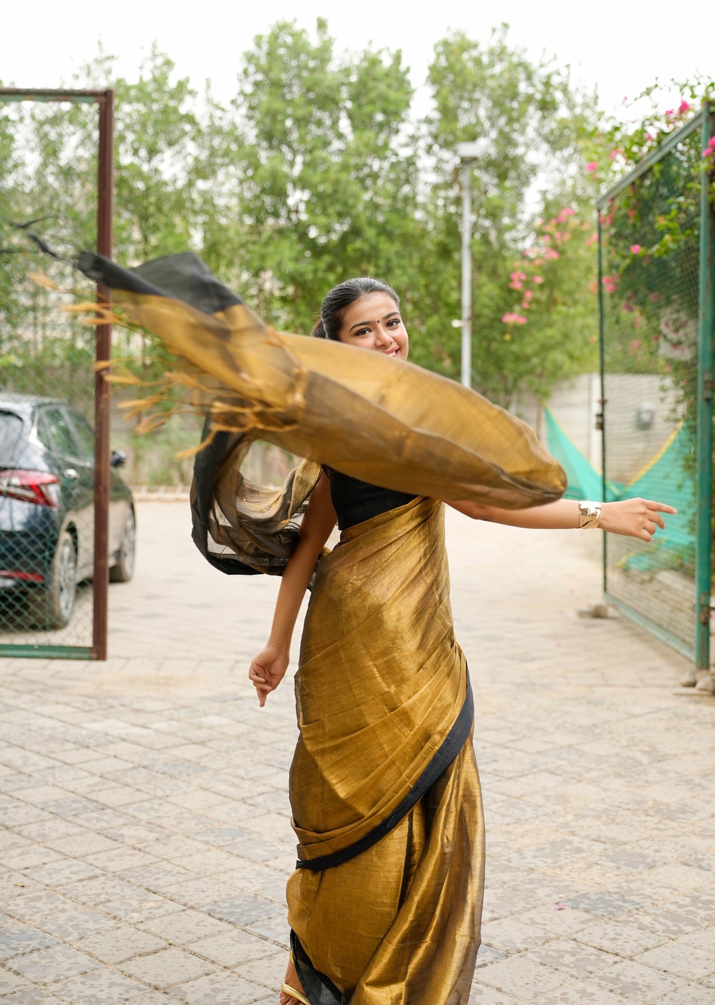 Molten Majesty – Antique Gold Tissue Silk Saree
