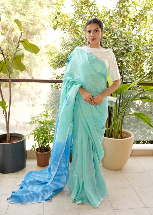 Aqua Blue Linen Saree with Hand Embroidered Floral Motifs