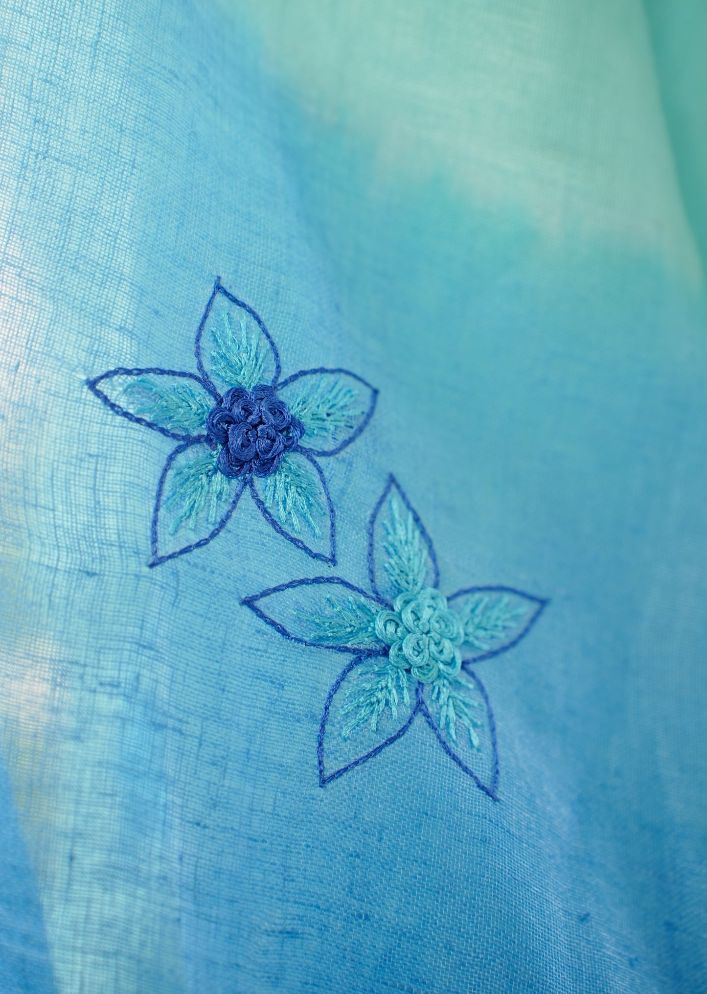 Aqua Blue Linen Saree with Hand Embroidered Floral Motifs