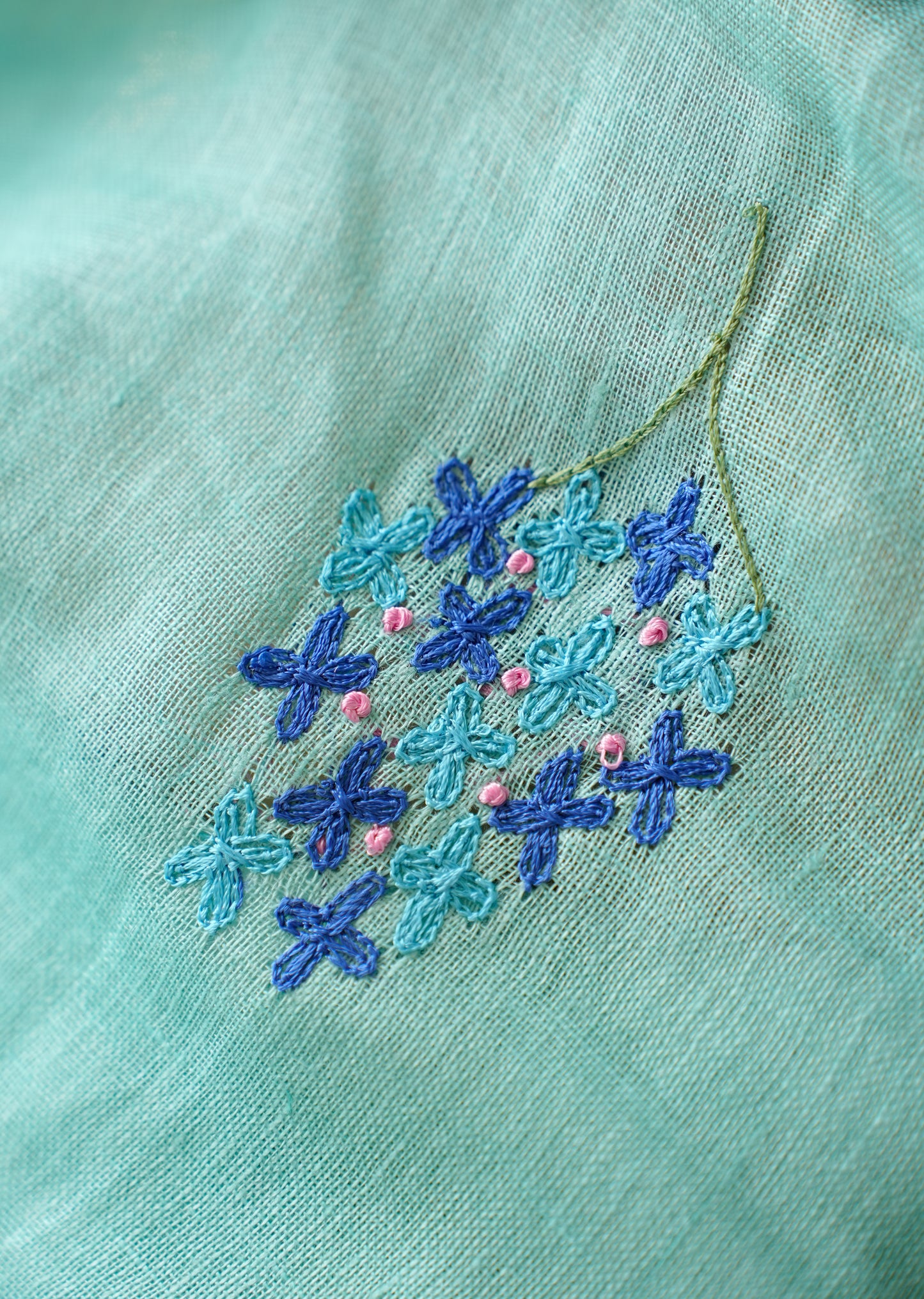 Aqua Blue Linen Saree with Hand Embroidered Floral Motifs